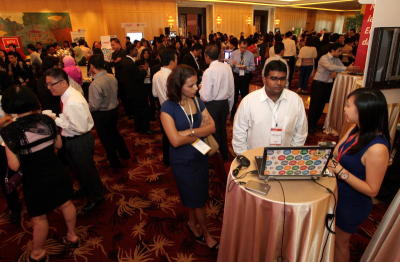 Melding of minds: Guests at the myStarjob launch mingling and visiting booths at the One World Hotel in Kuala Lumpur.